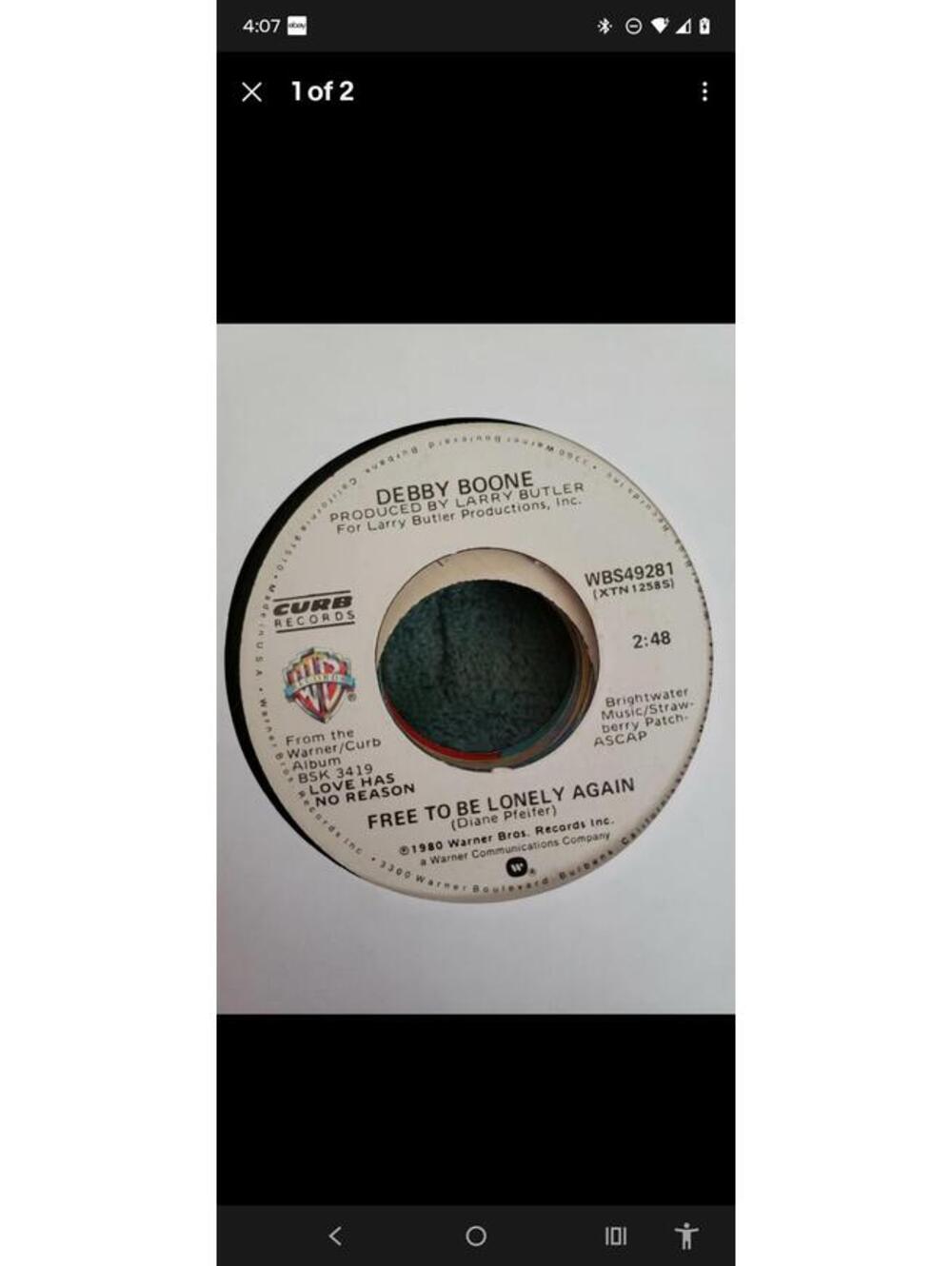 Debby Boone -free to be lonely again/love put a song heart